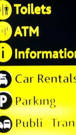 Directional-signs-at-airport-terminal