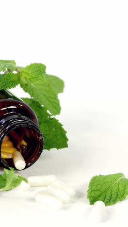 Medicine-bottle-with-mint-leaves