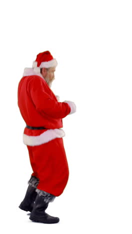 Santa-claus-dancing-against-white-background