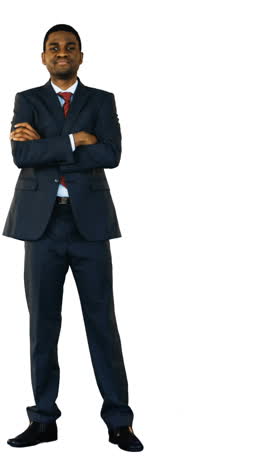 Portrait-of-smiling-businessman-standing-with-arms-crossed