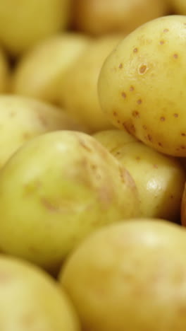 Close-up-of-raw-potatoes-in-basket