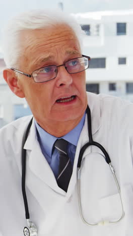 Male-doctor-examining-x-ray