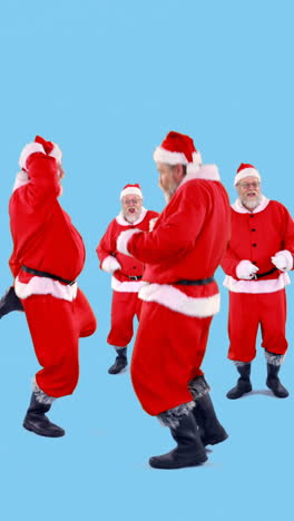 Grupo-De-Santa-Claus-Bailando