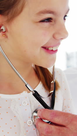 Male-doctor-examining-a-patient