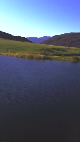 Aerial-of-lake-and-mountains