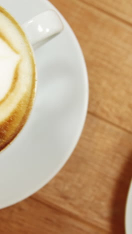 Close-up-of-various-coffee-cup-with-saucer