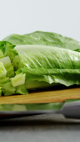 Vegetables-and-kitchen-knife-on-table