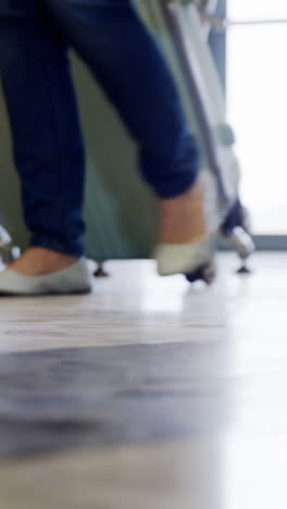 Passengers-walking-with-their-luggage-at-airport