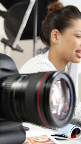 Photographers-having-discussion-on-personal-computer