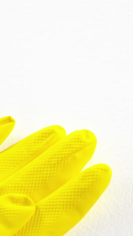 Close-up-of-yellow-gloves