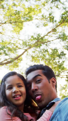 Father-and-daughter-taking-a-selfie