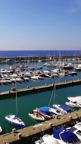 Aerial-of-boats-moored-at-harbor