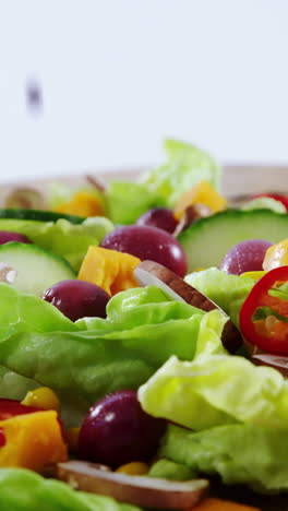 Sauce-being-poured-in-salad