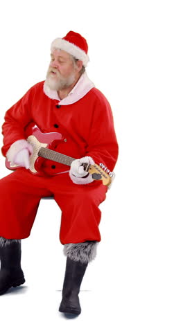 Santa-claus-singing-a-song-and-playing-guitar