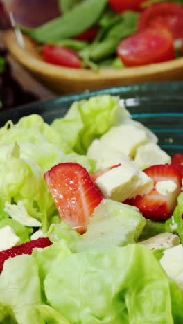 Oil-being-poured-in-salad