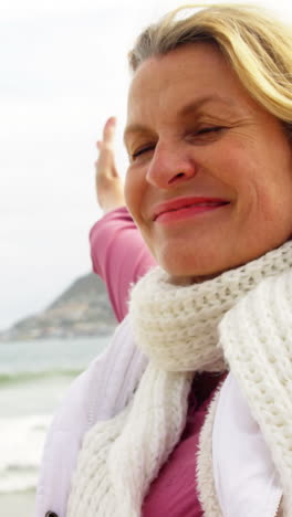 Beautiful-woman-enjoying-on-beach