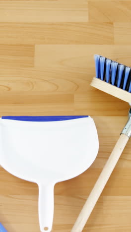 Two-brooms-and-dustpan