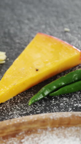 Flour-on-plate-with-spices-and-vegetables-on-table