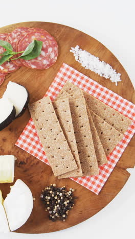 Cheese-with-ham-on-wooden-board