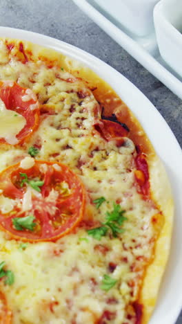 Baked-pizza-with-cherry-tomato-toppings-and-ingredients