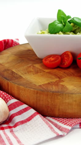 Cherry-tomatoes-and-garlic-with-bowl-of-pasta