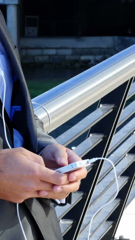 Businessman-using-mobile-phone