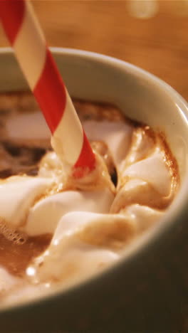 Cup-of-coffee-with-straw-on-a-table