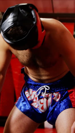 Male-boxer-wearing-headgear