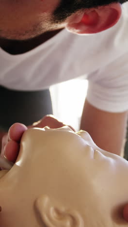 Male-paramedic-during-cardiopulmonary-resuscitation-training