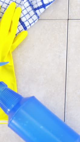 Yellow-rubber-gloves-and-spray-bottle