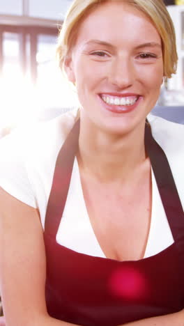 Portrait-of-waitress-standing-behind-the-counter