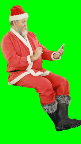 Santa-claus-using-mobile-phone