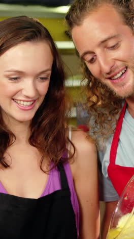 Workers-preparing-juice-at-juice-counter