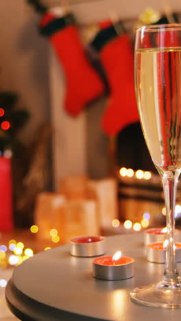 Champagne-glasses-and-gifts-box-on-table