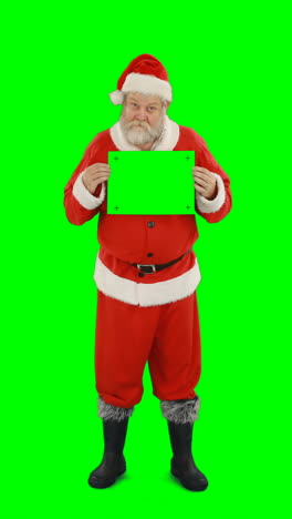 Santa-claus-holding-blank-board