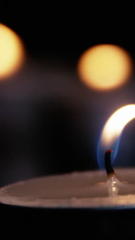 Close-up-of-burning-candle