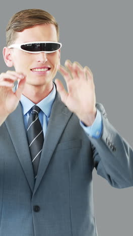 Businessman-in-virtual-video-glasses-using-digital-screen