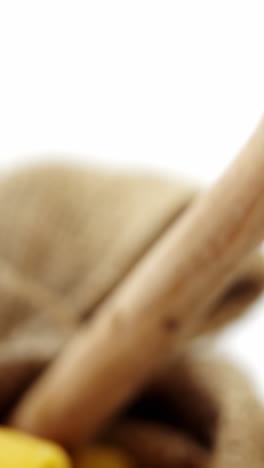 Close-up-of-raw-pasta-with-wooden-spoon