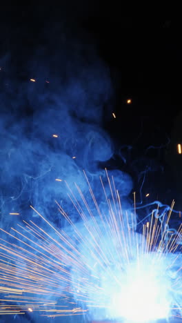 Welder-welding-a-metal