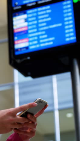 Woman-texting-on-mobile-phone