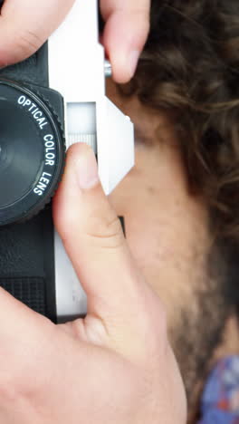 Photographer-taking-photo-with-vintage-camera