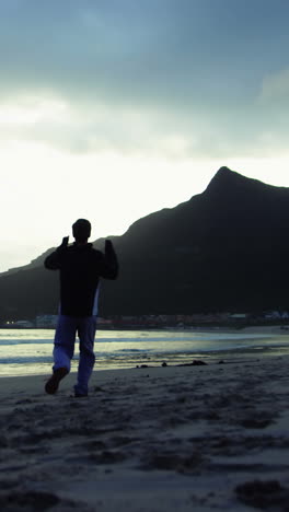 Man-running-on-the-beach