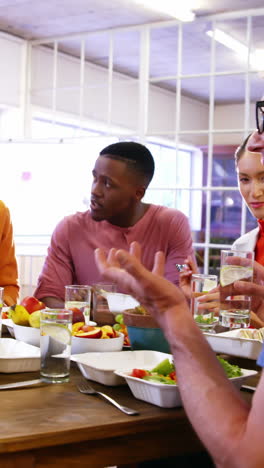 Group-of-business-executives-having-breakfast