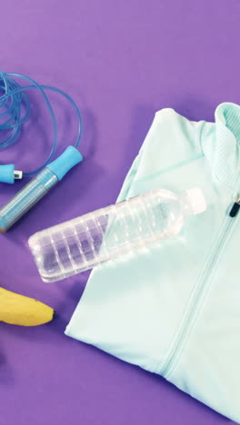 Banana,-skipping-rope,-dumbbells,-water-bottle-and-zipper