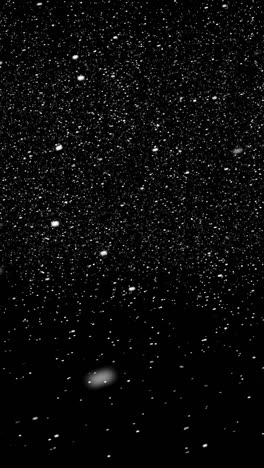 Particles-of-snow-falling-from-sky