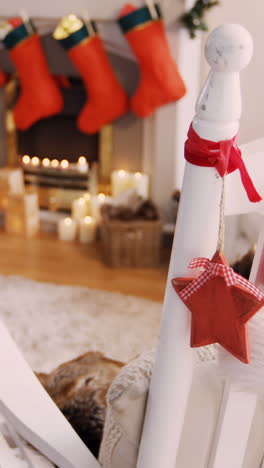 Santa-hat-and-christmas-decoration-hanging-on-chair