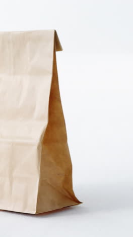 Brown-shopping-bag-on-white-background