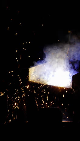 Welder-welding-a-metal