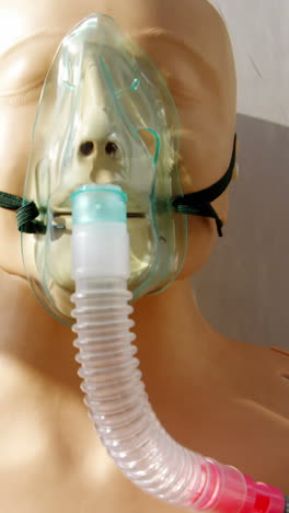 Dummy-patient-simulated-mannequin-wearing-oxygen-mask