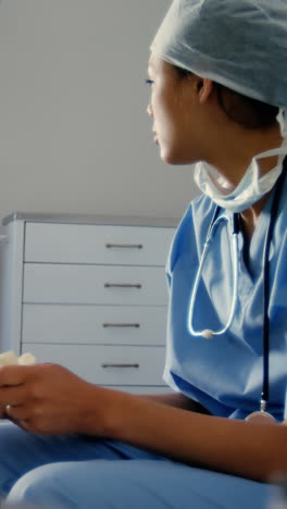 Sad-female-surgeon-sitting-on-the-chair